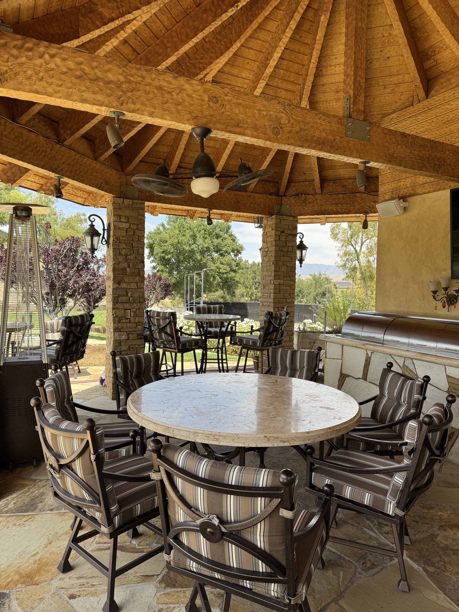 Gazebo dining chairs with striped cushions